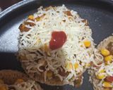 A picture of step 5 of Spicy corn slices.
