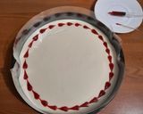 Foto del passaggio 19 della ricetta Cheesecake San Valentino con cioccolato bianco e gelée di lamponi