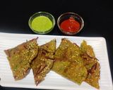 A picture of step 5 of Veggie loaded moong dal chilla.