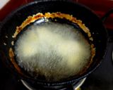 A picture of step 3 of Raw banana masala.