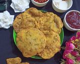A picture of step 6 of Aloo Puri.