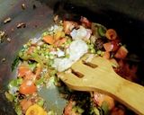A picture of step 2 of Aalu soyabean pulav.