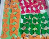 A picture of step 23 of Homemade farfalle pasta in three colour.