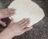 A picture of step 3 of Italian thin crust pizza.