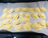 A picture of step 1 of Sheet Pan Pierogis with Italian Sausage.
