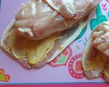 A picture of step 2 of Chicken wrapped in Bacon.