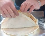 A picture of step 3 of Hummus Tikka Wrap.