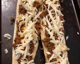 A picture of step 2 of Sloppy joes stuffed french bread.