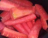 A picture of step 1 of Gajar ka halwa.