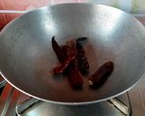 A picture of step 1 of Lonka Pora Rui(Fish Curry in Roasted Chilli Sauce).