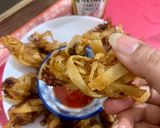 A picture of step 4 of Left over chowmien wrapped with torn Manda patti strips.