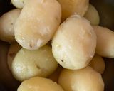 A picture of step 1 of Durga Ashtami Platter - Luchi, Aloo Dum, Chola’r Dal.