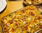A picture of step 17 of Cauliflower Chicken Enchilada Casserole.