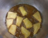 A picture of step 4 of Cardamon mandazi.