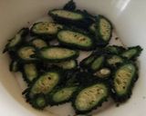 A picture of step 1 of Karela chips with apple juice (bitter guard chips).