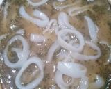 Foto del paso 4 de la receta: Langostinos al ajillo, apio, perejil y manzana, rabas y cornalitos