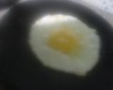 A picture of step 5 of Half fry omellete with 🍞bread.