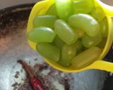 A picture of step 1 of Green Grapes Ki Khatti Meethi Sabzi / Chutney.