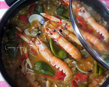 Foto del paso 24 de la receta: Arroz con jugos de cigalas, almejas y pimientos tipo padrón