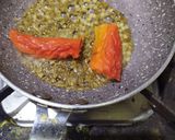 A picture of step 7 of Drumstick(sahjan) leaves paratha with drumstick chutney.