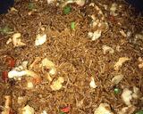 A picture of step 12 of Masala brown rice.