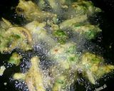 A picture of step 3 of Aloo palak k pakoray.