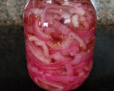A picture of step 4 of Super Easy Pickled Red Onions.