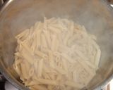 Foto del paso 4 de la receta Macarrones con jamón, guisantes y lascas de parmesano