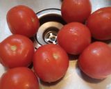 A picture of step 1 of Roasted Tuna Stuffing in a Tomato.