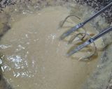 A picture of step 6 of 2 tier Red velvet cake.