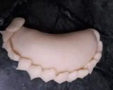 A picture of step 4 of Gulkand mawa stuffed gujiya.