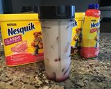 A picture of step 3 of Nesquik milkshake.