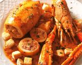 Foto del paso 12 de la receta: Calamar relleno de sus tentáculos, aletas y Cigala
