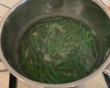 A picture of step 3 of Courgetti with pesto and green beans.