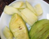 A picture of step 3 of Zucchini stuffed with cheesy Guacamole.