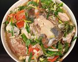 Hình bước làm 4 của món Canh chua đầu cá nheo nấu măng