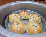 A picture of step 7 of Pumpkin style stuff buns.