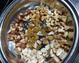 A picture of step 4 of Singhara atta dry fruits halwa.