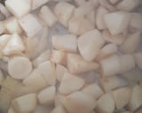 A picture of step 1 of Curried parsnip soup.