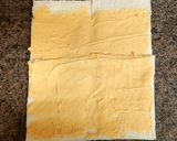 A picture of step 2 of Snack rolls from toasted bread.