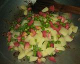 A picture of step 5 of Vegetable Pulao💚💛💚.