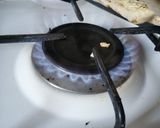 A picture of step 6 of Garlic tandoori roti on tava.