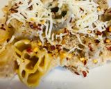 A picture of step 3 of Mix pasta in white sauce.