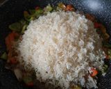 Foto del paso 3 de la receta: Arroz rojo con Maíz