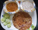 A picture of step 3 of Chanadal with parantha.