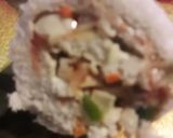 A picture of step 7 of Bread pin wheel sandwich.