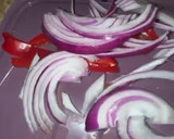 A picture of step 1 of Pickled Red Onion.