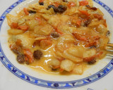 Foto del paso 4 de la receta: Tortilla de patatas con zanahoria y pasas