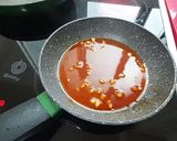 Foto del paso 4 de la receta: Pechuga de pavo adobada con verduras rehogadas