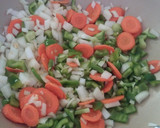 Foto del paso 3 de la receta: Atún con papas y garbanzos al wok